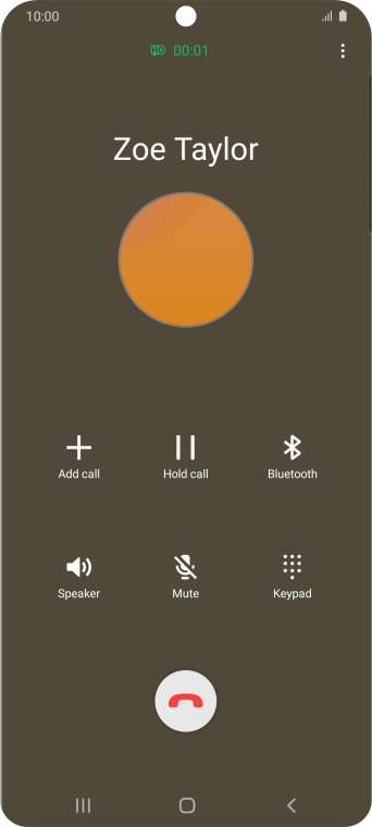 Press the end call icon.