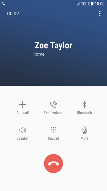 Press the end call icon.