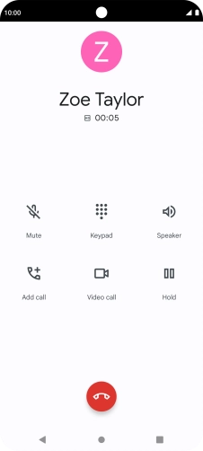 Press the end call icon.