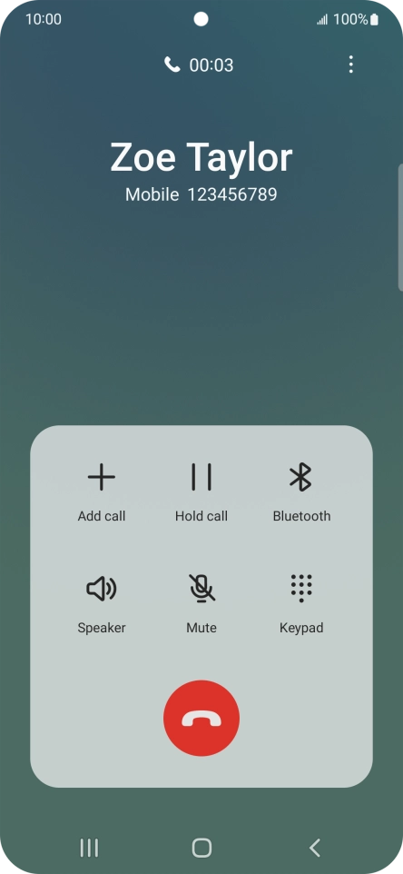 Press the end call icon.