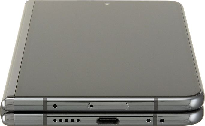 Find the opener for the SIM holder. Insert the opener into the small hole in the SIM holder.