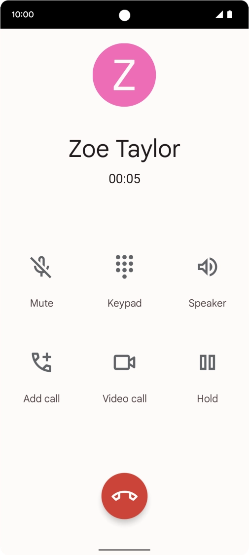 Press the end call icon.
