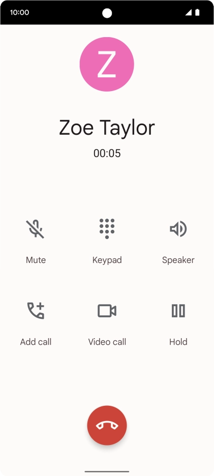 Press the end call icon.