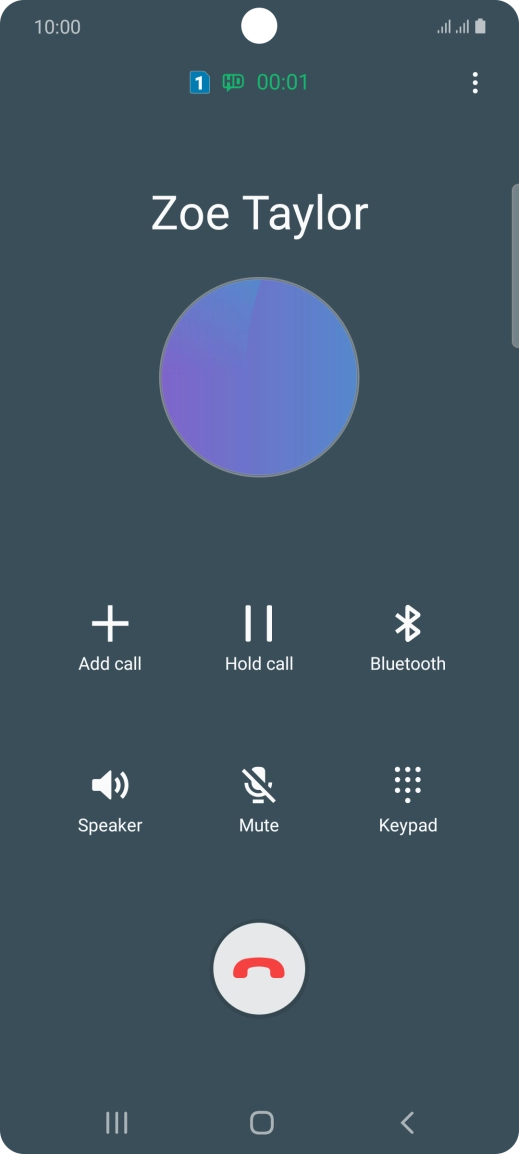 Press the end call icon.