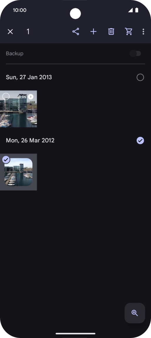 Press the required pictures or videos to select them.