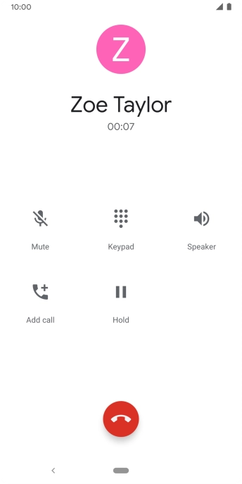 Press the end call icon.