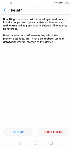 Press RESET PHONE. Wait a moment while the factory default settings are restored. Follow the instructions on the screen to set up your phone and prepare it for use.