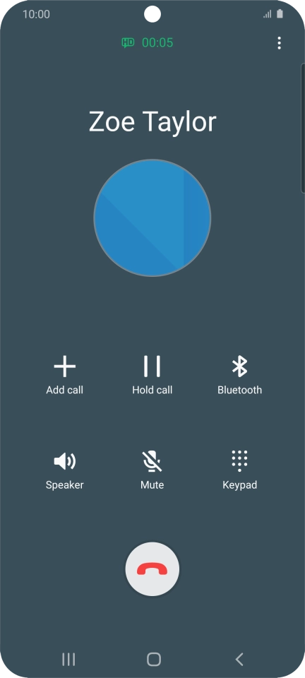 Press the end call icon.
