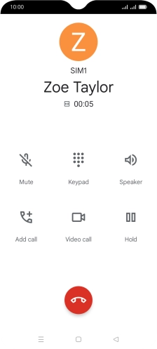 Press the end call icon.