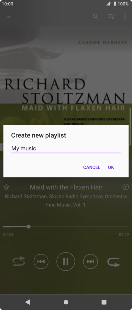 Key in a name for the playlist and press OK.