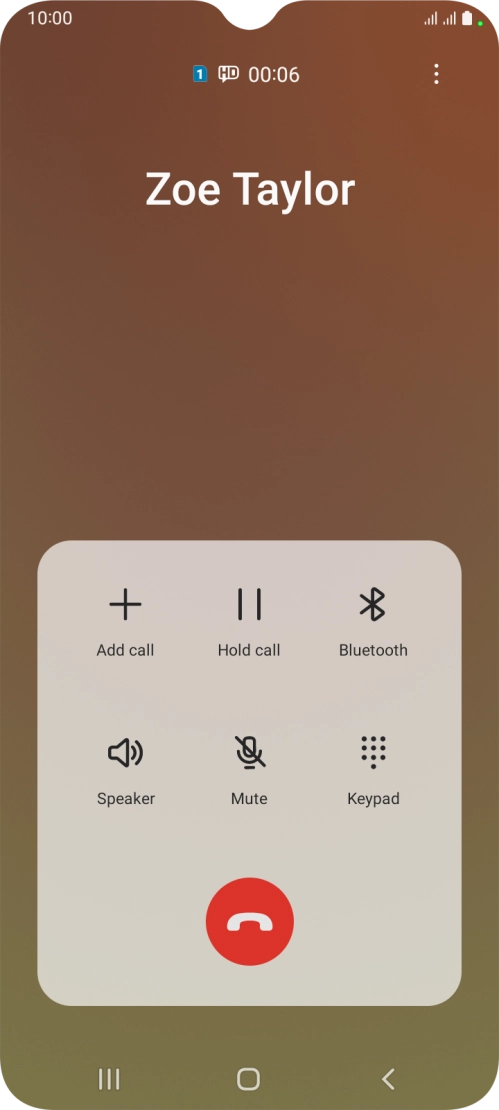 Press the end call icon.