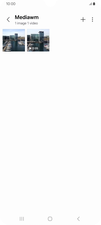 Press and hold any picture or video.