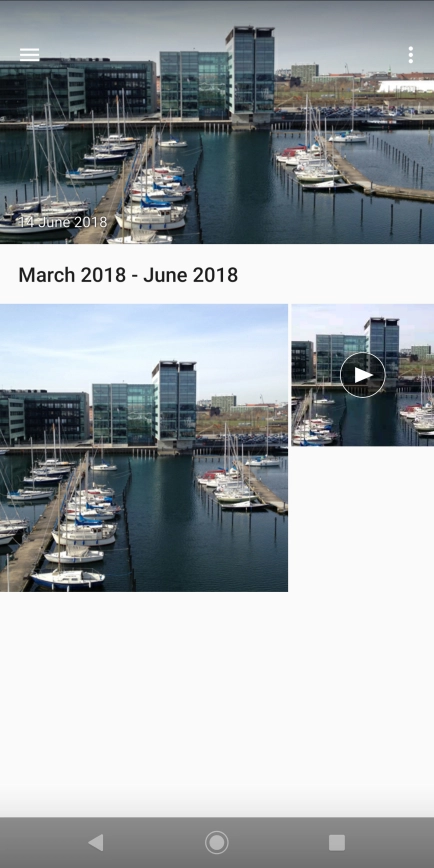 Slide your finger right starting from the left side of the screen.