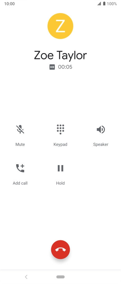 Press the end call icon.