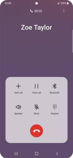 Press the end call icon.
