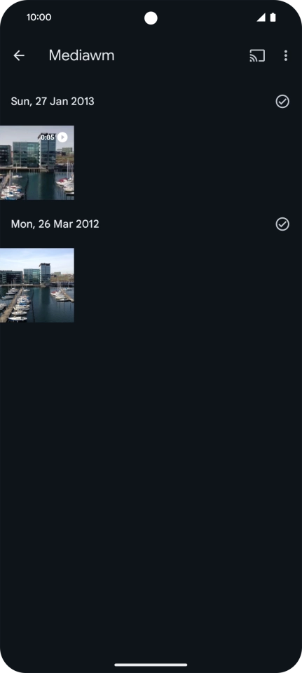 Press and hold any picture or video clip.