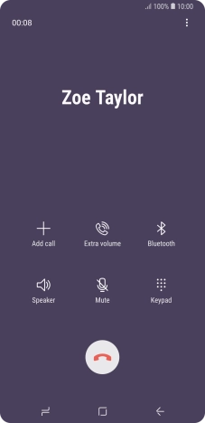 Press the end call icon.