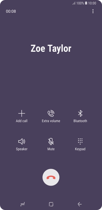 Press the end call icon.