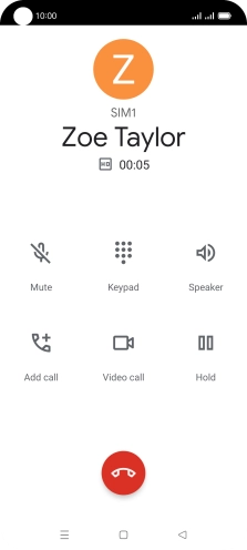 Press the end call icon.