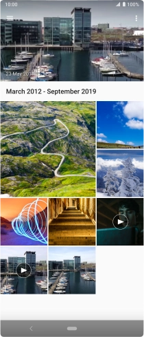 Slide your finger right starting from the left side of the screen.