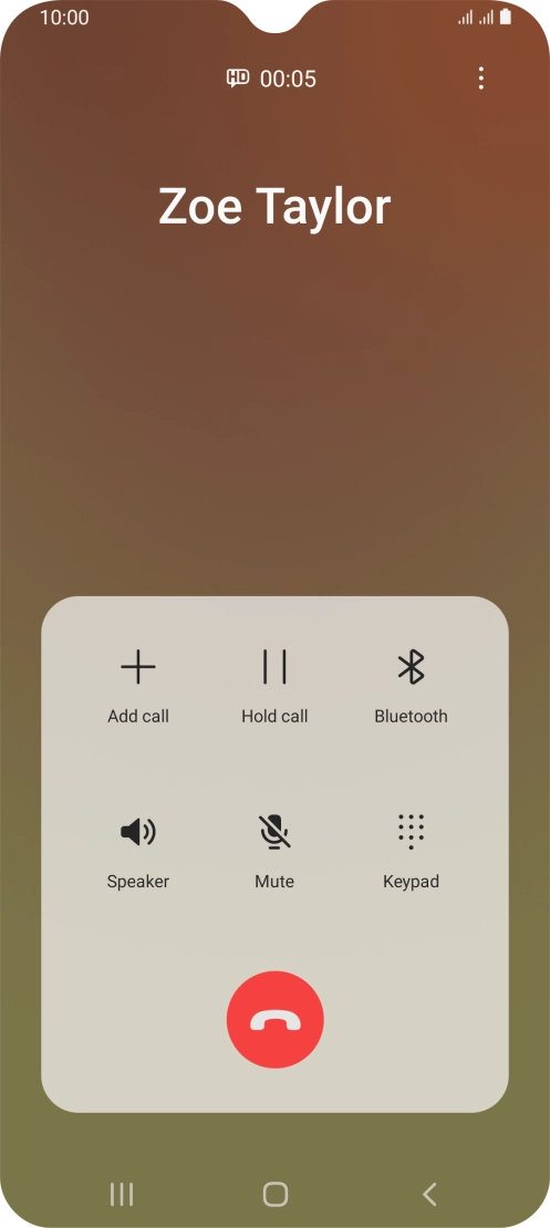 Press the end call icon.