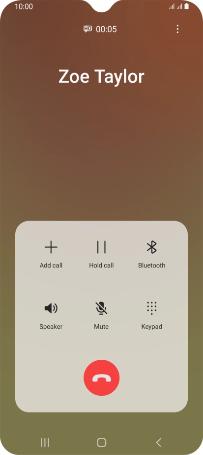 Press the end call icon.