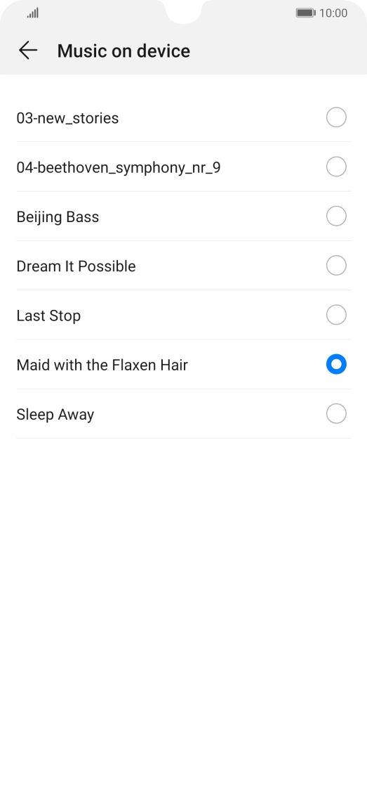 Once you've found a ring tone you like, press arrow left.