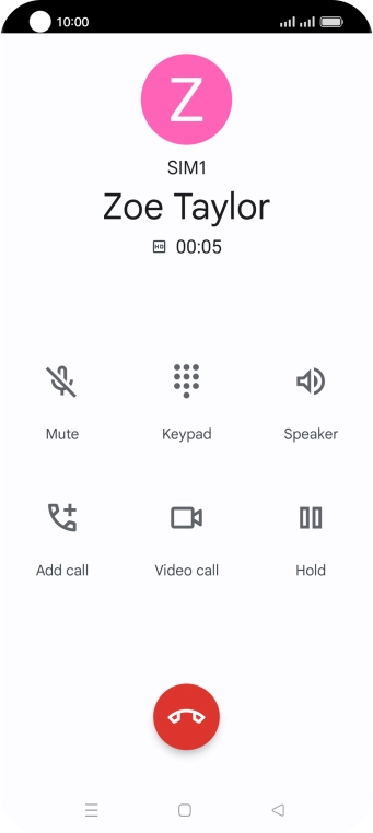 Press the end call icon.