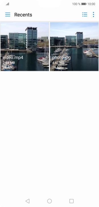 Slide your finger right starting from the left side of the screen.