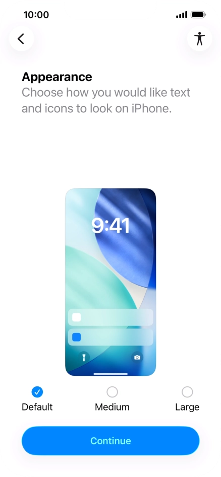 Select the required text and icon size on your phone and press Continue.