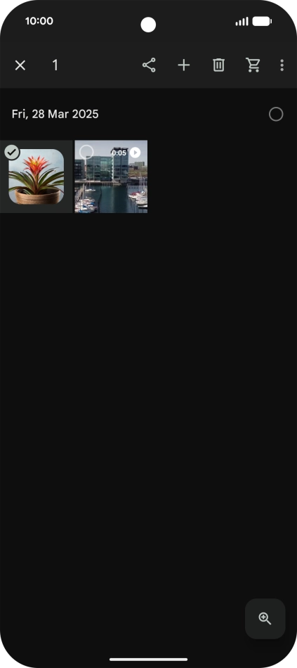 Press the required pictures or videos to select them.