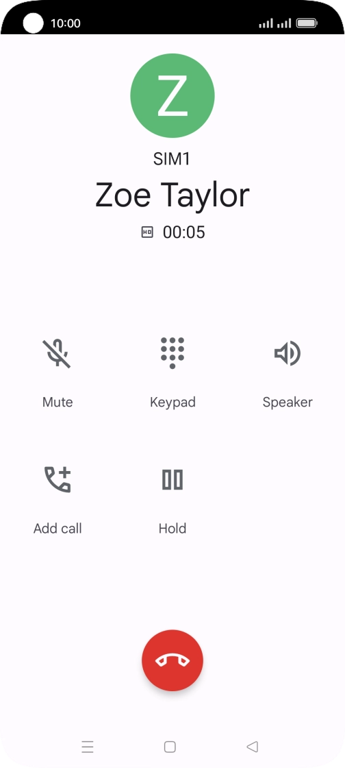 Press the end call icon.