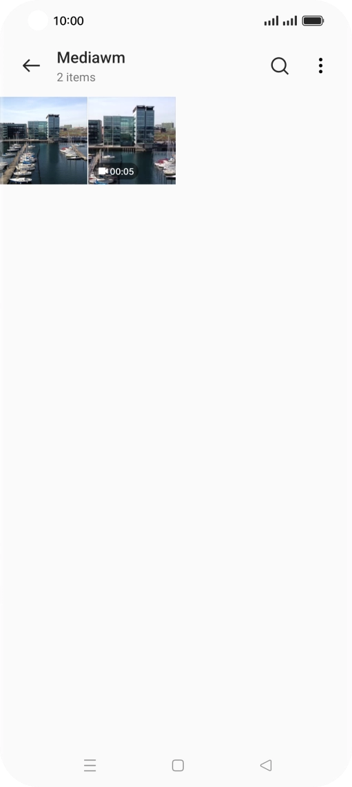 Press and hold any picture or video clip.