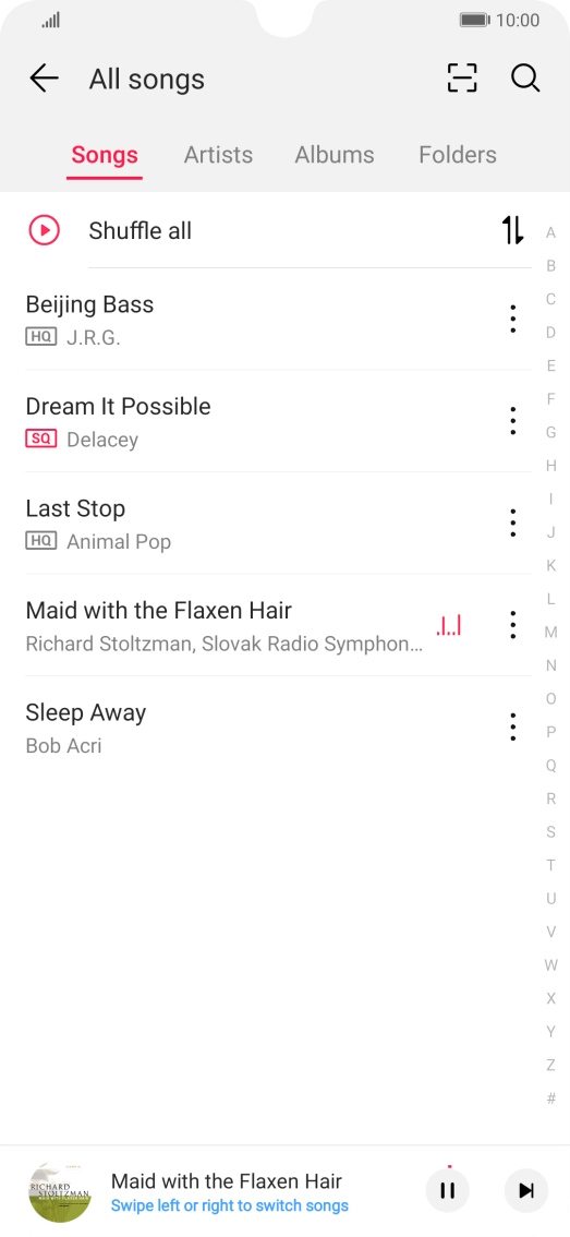 Press the song title at the bottom of the screen.