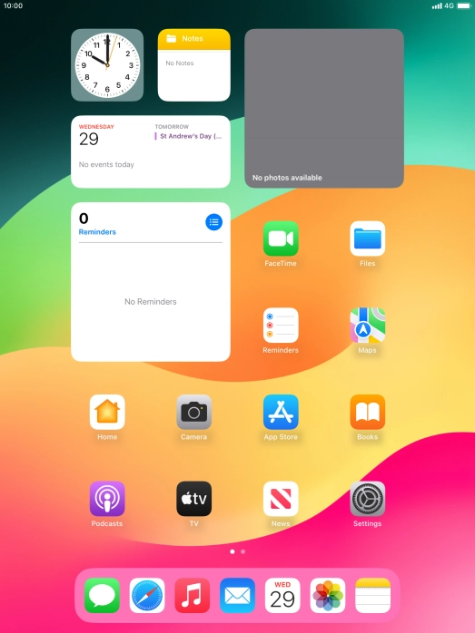 Slide your finger slowly upwards starting from the bottom of the screen until the list of running applications is displayed.
