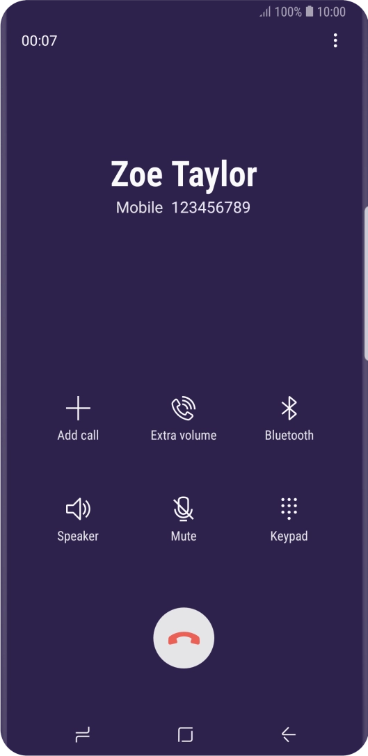 Press the end call icon.