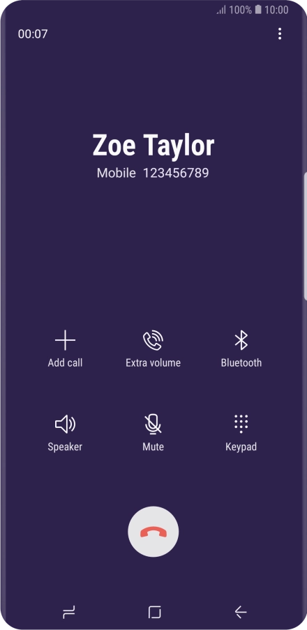 Press the end call icon.