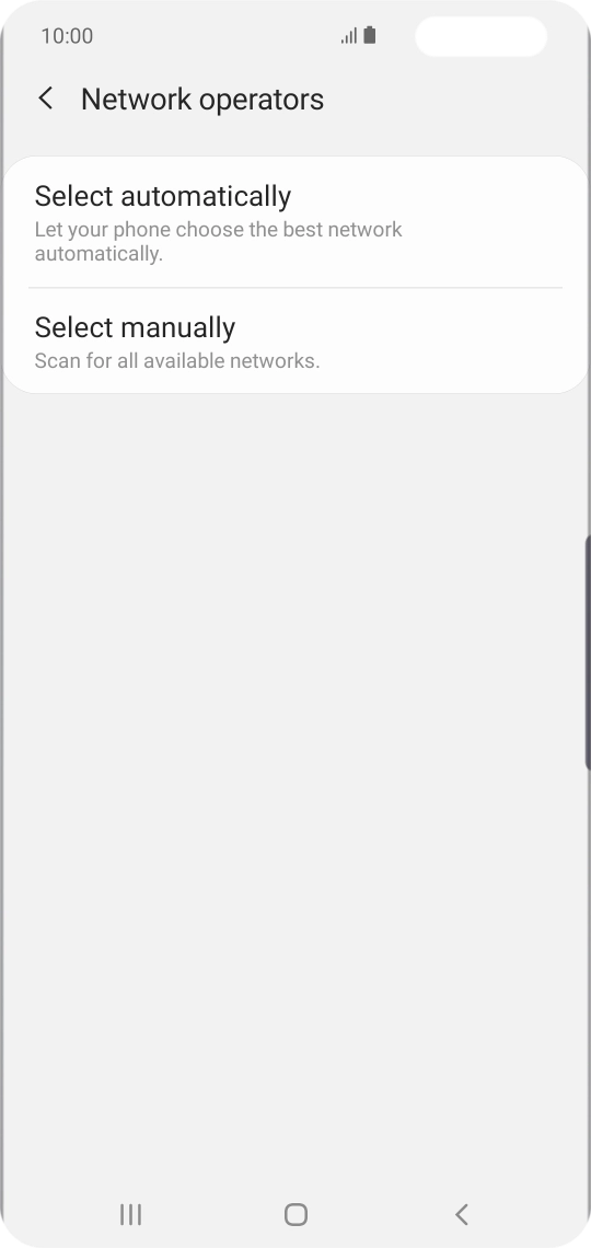 Press Select manually and your phone will search for networks.