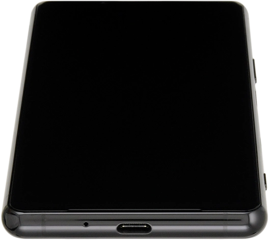 Connect the charger to the socket and to a wall socket.