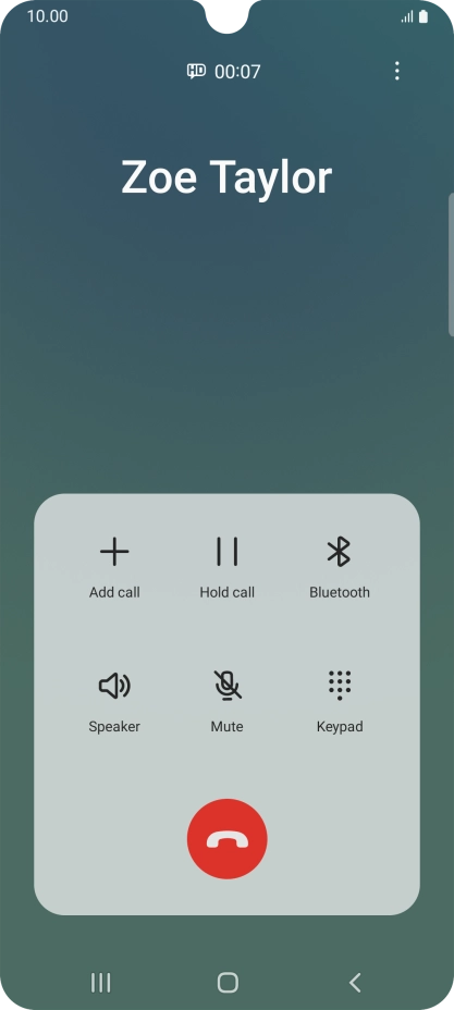 Press the end call icon.