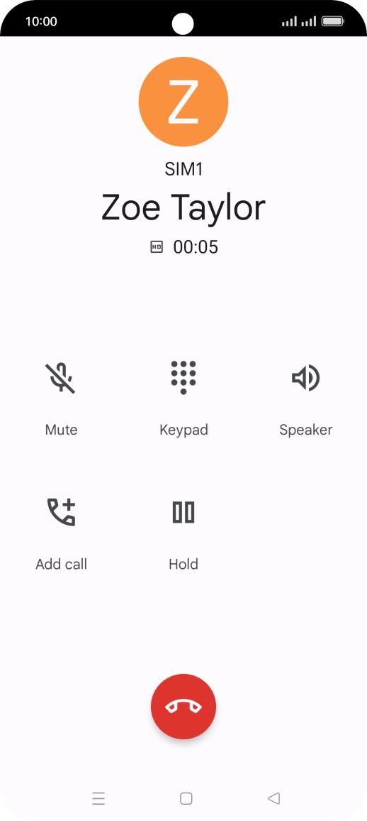 Press the end call icon.