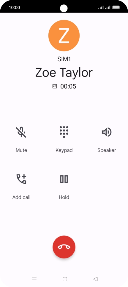 Press the end call icon.