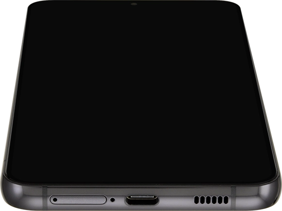 Insert the opener into the small hole in the SIM holder.