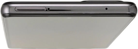 Find the opener for the card holder. Insert the opener into the small hole next to the card holder.