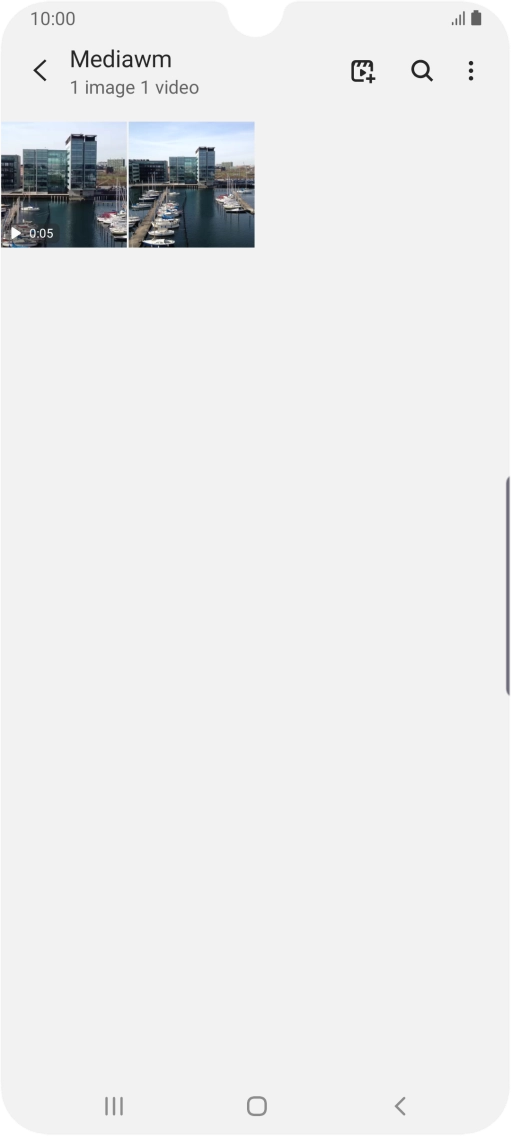 Press and hold any picture or video clip.