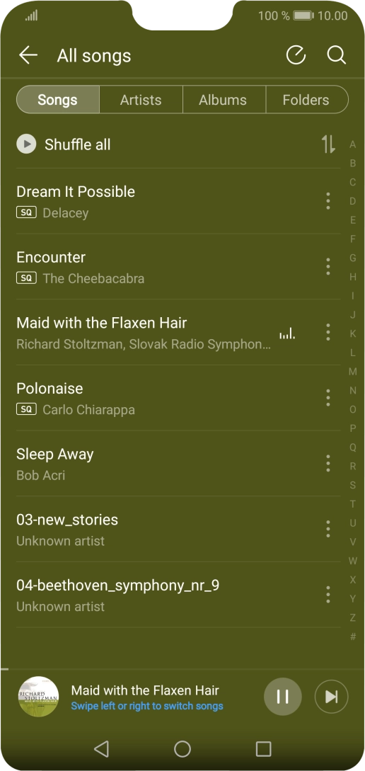 Press the song title at the bottom of the screen.