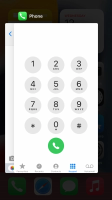 Slide upwards on the required application to end it.