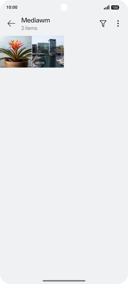 Press and hold any picture or video.