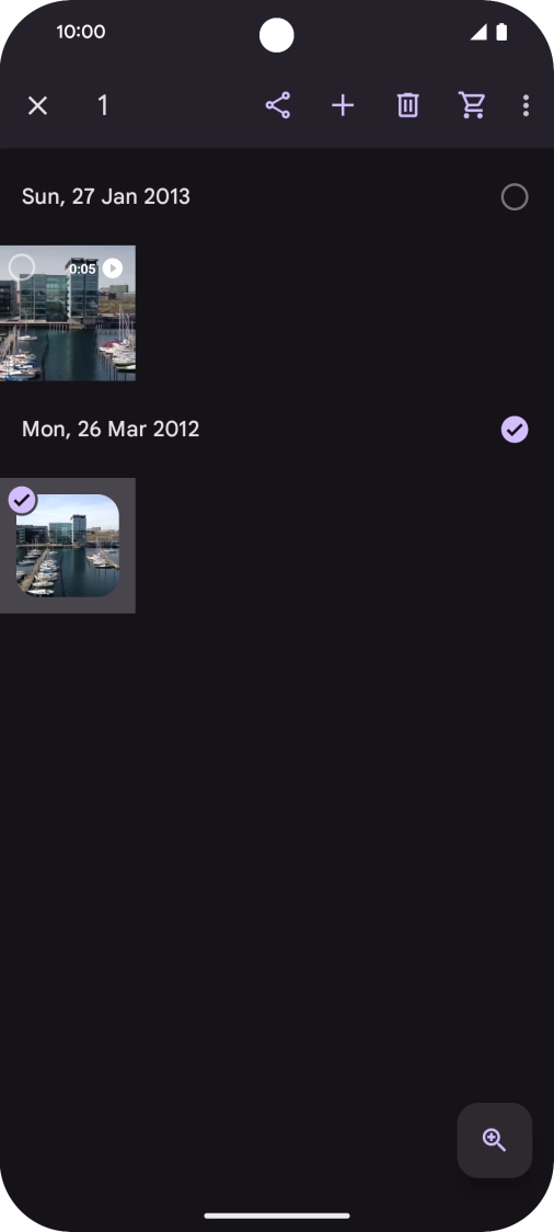 Press the required pictures or videos to select them.