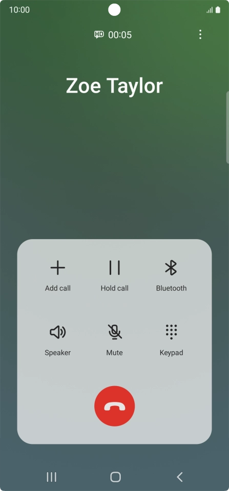 Press the end call icon.